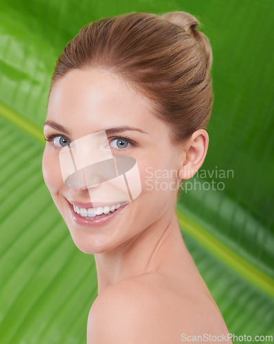 Image of Woman, beauty and portrait with leaves, skincare or sustainability for organic cosmetics. Girl, person or model with palm tree, plants or wellness with transformation for glow with facial dermatology