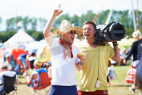 Image of Holiday, radio or friends at outdoor music festival, concert or party for listening to song for freedom. Singing, sound track audio or happy people with beer at carnival event on vacation celebration