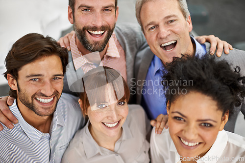 Image of Business people, portrait and smile for teamwork with confidence from above for collaboration, friends or partnership. Men, women and happy at creative agency for startup pride, workspace or together