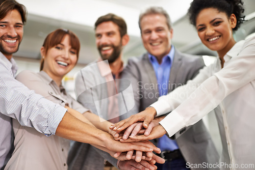 Image of Portrait, collaboration and business people with hands in huddle at office for meeting, motivation or support. Smile, goals and target with happy employee team in workplace for celebration of bonus