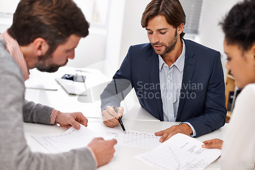 Image of Business people, finance and meeting with documents for budget, profit or corporate statistics at office. Group of employees in discussion with paperwork or financial report for growth or revenue