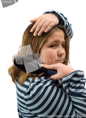 Image of Girl Brushing Her Hair