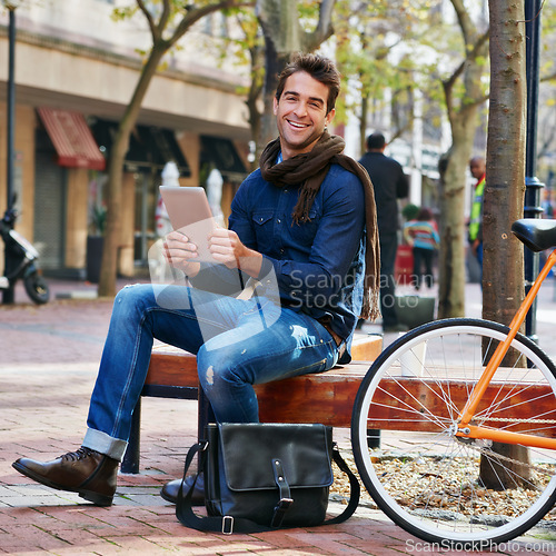 Image of Portrait, outdoor and smile with man, tablet and bicycle with connection and relax with internet and social media. Person, funny and New York with guy and technology with digital app or communication