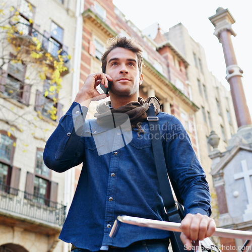 Image of Outdoor, phone call and man with sunshine, travel and communication with bike or Italy. Person, commute or connection with cellphone or mobile user with discussion, cyclist or contact with urban town