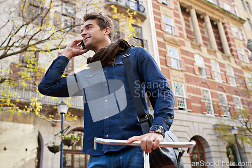 Image of City, phone call and man with sunshine, bike and communication with urban town and Italy. Person, outdoor or connection with cellphone or mobile user with discussion or contact with cyclist or travel