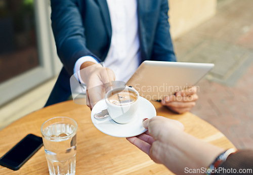 Image of Waiter, serving and hands with coffee on table at cafe with customer reading tablet for internet, news or article. Restaurant, service or person pov giving espresso to man with tech on social media