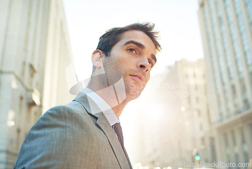 Image of City, confident and male lawyer with vision of future, ideas or planning for property development. Professional accountant, sunlight and thinking of investments, work or opportunities in South Africa