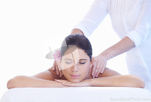 Image of Sleep, massage and woman at spa with flower for health, wellness and luxury holistic treatment. Self care, peace and girl on table with masseuse for body, balance and relax with hotel service