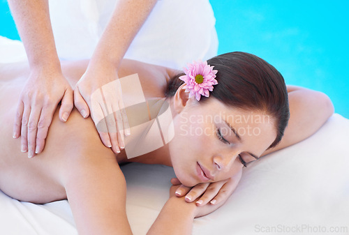 Image of Relax, massage and woman at spa for health, wellness and calm with holistic treatment. Self care, peace and girl on table with masseuse for body therapy, shoulder muscle and luxury hotel service.