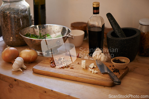 Image of Vegetables, salad and wooden board for cooking lunch, dish and nutrition for diet at home. Wellness, health and organic food with meal, vegetarian and green ingredients for vegan in a kitchen