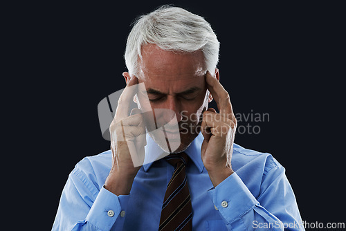 Image of Stress, CEO and thinking in studio with anxiety for meeting, public speaking or presentation. Mature male person, leader and hand on temples for headache, ideas or frustrated on black background