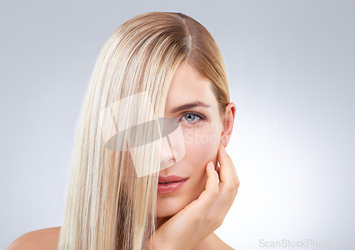 Image of Straight hair, hand and portrait of blonde woman, beauty and makeup isolated on a white studio background. Face, touch and hairstyle of model in cosmetics, skincare or salon treatment on mockup space