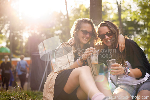 Image of Beer, laughing and woman friends in forest together with audience or crowd at event, festival or party. Smile, funny and young people having fun in nature woods for social gathering and celebration