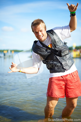 Image of Portrait, Man and outdoor with shaka in water with happiness, river fun for summer holiday in Australia. Hot day, lake and vacation for nature activity with leisure to relax and enjoy sunny day.