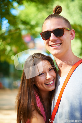 Image of Portrait, happy and couple at music festival outdoor, event and celebration on valentines day together in summer. Face, woman and smile of man in sunglasses, party and carnival for love in nature