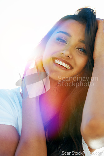 Image of Mexican woman, portrait and smile for outdoor, travel and breeze for summertime in Bali for vacation. Female person, lens flare and relax abroad in holiday outside and happy for nature and break