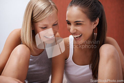 Image of Women, friends and look away with closeup in pajamas for sleepover, girls night and talk together in house. Beautiful, friendship and happiness with comedy for laughing, fun and indoors house