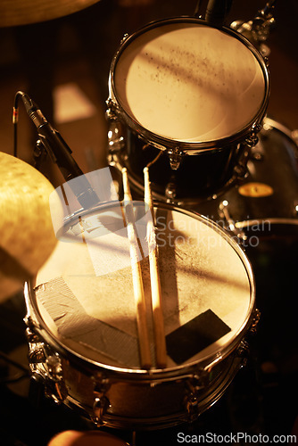 Image of Drum, microphone and music in closeup for studio, record and rehearsal for stage, performance and studio with passion. Instrument, equipment and musician with entertainment for live at concert