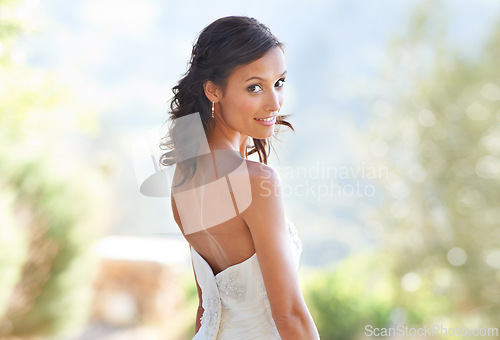 Image of Outdoor, wedding and portrait of woman from back with fashion, dress and happiness. Summer, event and bride smile with fancy style for gown in celebration of marriage in forest, park or garden