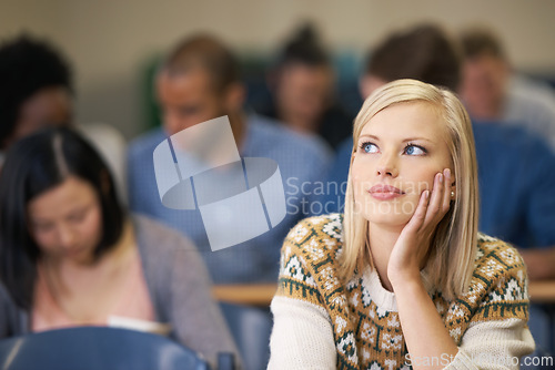 Image of Woman, student and thinking in university lecture hall to prepare, vision and study for exams. Idea, serious and focus on plan for determination, knowledge and information for assessment task