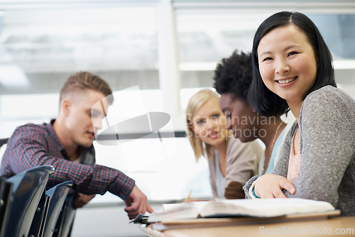 Image of Portrait, learning or students in library studying education, knowledge or paperwork in college project. Explain, university or group of friends with teamwork in school meeting for research or books