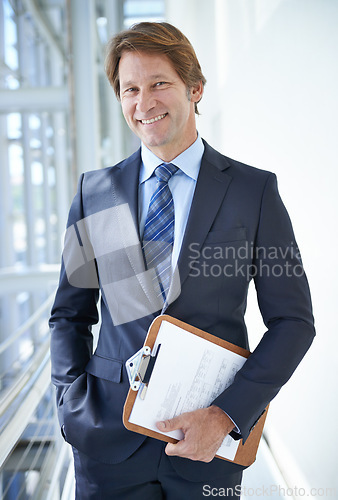 Image of Clipboard, office and portrait of business man in corridor with documents, paperwork and contract. Professional, corporate lawyer and person with papers for planning, notes and project management