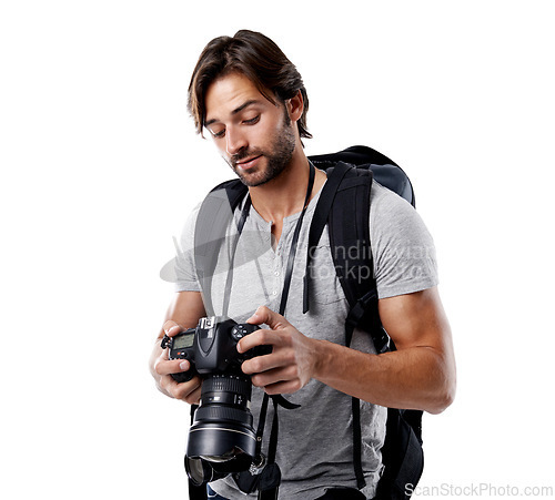 Image of Man, camera and photography with technology in studio, press or media on white background. Photographer, photo journalist check work and creativity with paparazzi, equipment and backpack in studio