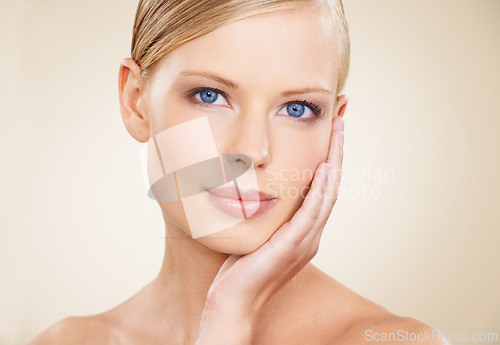 Image of Beauty, cosmetics and portrait of elegant woman in studio with beauty, natural makeup or facial glow. Glamour, skincare and face of girl on beige background for healthy skin, shine and wellness.