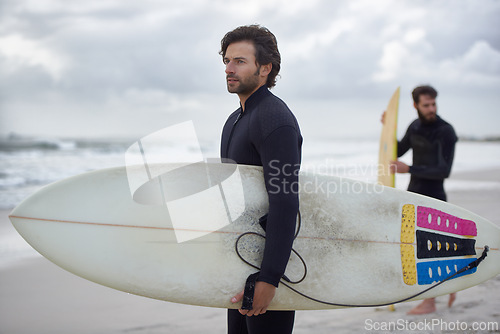 Image of Man, friends and surfer on beach for fitness, sport or waves on shore in outdoor exercise. Young male person or people with surfboard for surfing challenge or hobby on ocean coast or water in nature