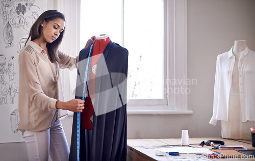 Image of Fashion, fitting and tailor measure on mannequin for sewing in workshop with creative project. Seamstress, measuring tape and work with textile fabric for garment in boutique with material on dummy