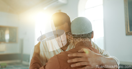 Image of Muslim, religion and people hug in mosque for community, support and greeting Islamic leader. Holy temple, prayer and men in religious building for Ramadan Kareem, Eid Mubarak and praying together