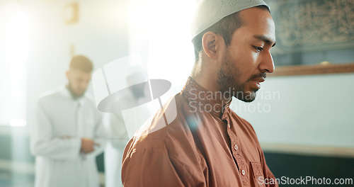 Image of Muslim, praying and man in a Mosque for spiritual religion together as a group to worship Allah in Ramadan. Islamic, Arabic and holy people with peace or respect for gratitude, trust and hope