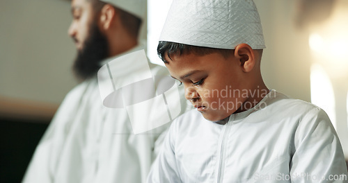 Image of Muslim, praying and man with child in mosque for learning, religious education and worship or prayer. Islamic community, religion and person and kid for Ramadan Kareem, Eid Mubarak and teaching Quran