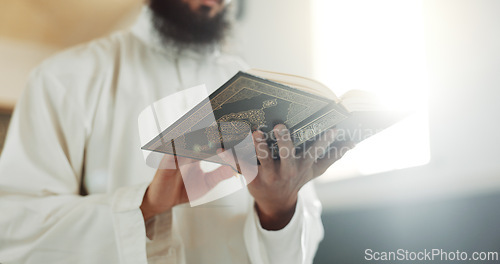 Image of Islam, prayer and man in mosque with Quran, mindfulness and gratitude in faith reading in peace. Worship, religion and commitment, Muslim Imam in holy temple praise and spiritual learning in Ramadan.