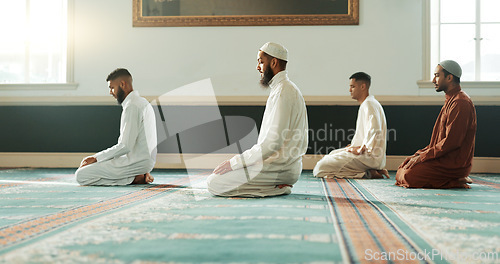 Image of Islamic, praying and holy men in a Mosque for spiritual religion together as a group to worship Allah in Ramadan. Muslim, Arabic and people with peace or respect for gratitude, trust and hope