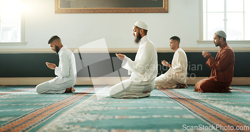 Image of Islamic, praying and holy men in a Mosque for spiritual religion together as a group to worship Allah in Ramadan. Muslim, Arabic and people with peace or respect for gratitude, trust and hope