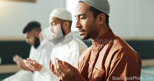 Image of Islamic, praying and men in a Mosque for spiritual religion together as a group to worship Allah in Ramadan. Muslim, Arabic and holy people with peace or respect for gratitude, trust and hope