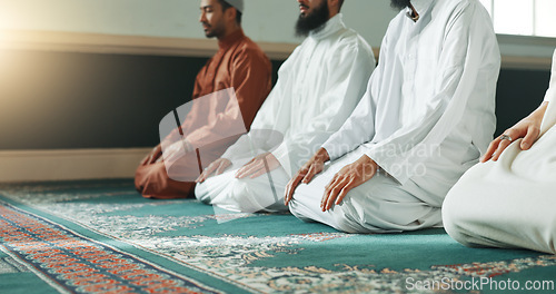 Image of Muslim, praying and men in a Mosque for spiritual religion together as a group to worship Allah in Ramadan. Islamic, Arabic and holy people with peace or respect for gratitude, trust and hope