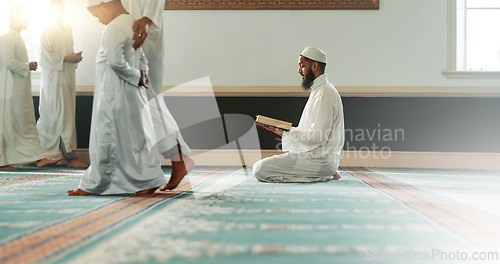 Image of Quran, islamic and man reading for faith in a mosque for praying, peace and spiritual care in holy religion for Allah. Respect, Ramadan and Muslim person with kindness, hope and humble after worship