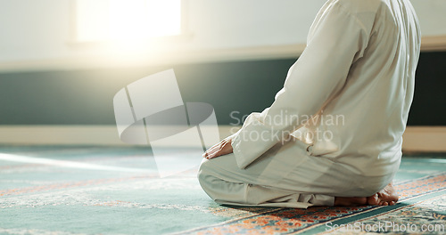 Image of Praying, Muslim and man with faith in a mosque for praying, peace and spiritual care in holy religion for Allah. Respect, Ramadan and Islamic person with kindness, hope and humble after worship