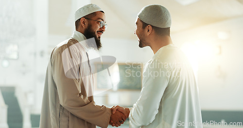 Image of Muslim, handshake and people in mosque for greeting, conversation and respect in Islamic community. Worship, friends and men shaking hands in religious building for Ramadan Kareem, prayer and support