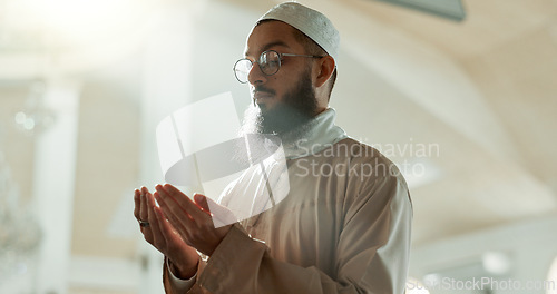 Image of Sunrise, islamic and man praying for faith in mosque for gratitude, peace and spiritual care in holy religion for Allah. Respect, Ramadan and Muslim person with kindness, hope and humble in worship