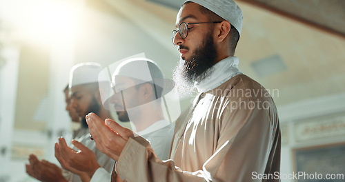 Image of Islam, praise and group of men in mosque praying with mindfulness, gratitude and celebration of faith. Worship, religion and Muslim people together in holy temple for spiritual teaching and peace.