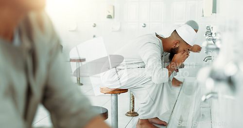 Image of Muslim, religion and men washing before prayer in bathroom for purity, and cleaning ritual. Islamic, worship and faith of group of people with wudu together at a mosque or temple for holy practice