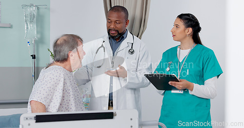 Image of Doctor, nurse and patient in discussion in hospital got medical diagnosis or treatment plan. Clipboard, consultation and team of healthcare workers talking to a senior man with checklist in a clinic.