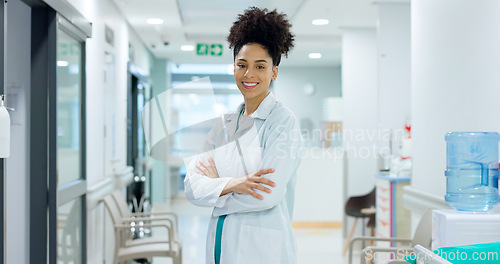 Image of Medical, face and woman or doctor with crossed arms for wellness, trust and service in hospital or clinic. Portrait, person and expert with happiness for career, cardiology or nursing at workplace