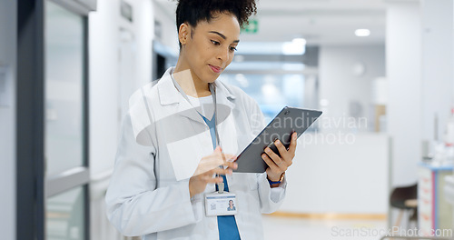 Image of Happy woman, doctor and tablet for research, communication or healthcare results at hospital. Female person, nurse or medical surgeon with technology for schedule, Telehealth or networking at clinic