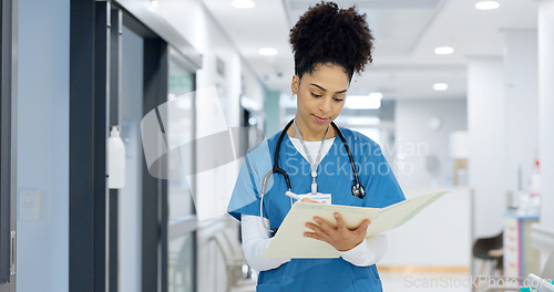 Image of Nurse, writing and document in hospital for insurance, healthcare and compliance report with patient information. Paperwork, checklist and doctor with medical notes in file, chart or folder in clinic