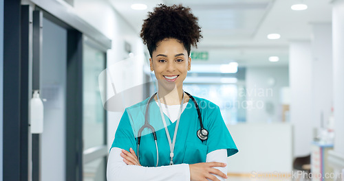 Image of Healthcare, face and woman or nurse with arms crossed for wellness, trust and service in hospital or clinic. Portrait, person or doctor with happiness for career, cardiology or nursing at workplace
