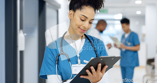 Image of Woman doctor, documents and writing in medical checklist, medical charts and hospital notes or clinic service. Healthcare worker or happy nurse with clipboard, paperwork and schedule update or report